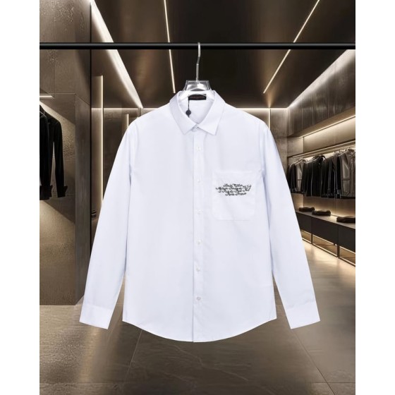 Louis Vuitton long-sleeved shirt with 1854 slogan on the front pocket and embroidered back.